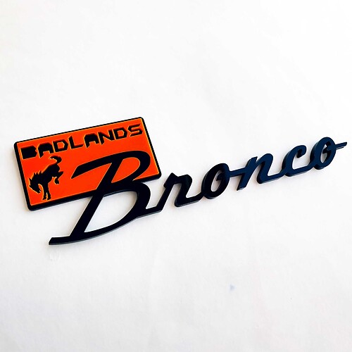 Badges badges badlands badges tailgate embranche 3d badge noir vs bleu 1
