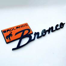 Badges badges badlands badges tailgate embranche 3d badge noir vs bleu 1
 3